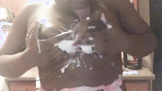 Naughty Ebony makes tits stick with whipped cream